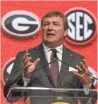  ??  ?? Georgia coach Kirby Smart speaks during SEC Media Days on July 17 in Atlanta. DALE ZANINE/USA TODAY SPORTS