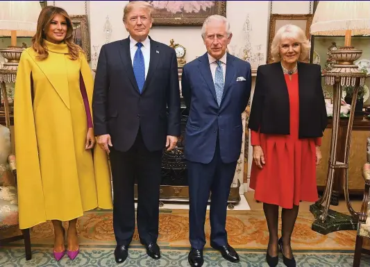  ??  ?? Quartet: Donald Trump and his wife Melania, left, with Prince Charles and Camilla at Clarence House last night