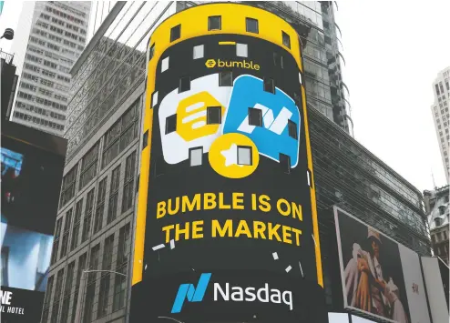  ?? Mike SEGAR / reuters ?? The display outside the Nasdaq Marketsite as the dating app operator Bumble Inc. (BMBL) made its debut
on the Nasdaq stock exchange during the company’s IPO in New York City on Thursday.