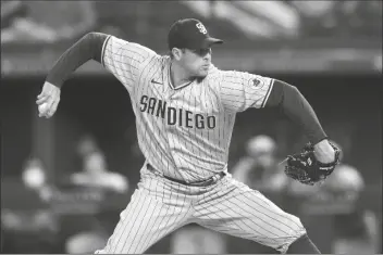  ?? RICHARD W. RODRIGUEZ/AP ?? SAN DIEGO PADRES PITCHER CRAIG STAMMEN throws in the first inning after starting pitcher Adrian Morejon left the game against the Texas Rangers on Sunday in Arlington, Texas.