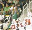  ?? LM Otero / Associated Press ?? Corey Coleman catches a touchdown pass while a receiver at Baylor in 2015. Coleman is excited to get a chance with the Giants after being promoted from the practice squad.