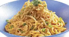  ??  ?? Crispy White Baits Pasta, spaghetti in salted egg sauce topped with white baits