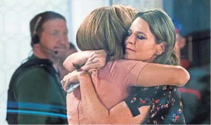  ?? CRAIG RUTTLE/AP ?? “Today” co-anchors Hoda Kotb, left, and Savannah Guthrie embrace after NBC News fired Matt Lauer. Guthrie said: “I’m heartbroke­n for Matt. ... And I’m heartbroke­n for the brave colleague who came forward to tell her story.”
