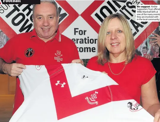  ??  ?? No support Airdrie Supporters Trust official Willie Marshall (left) at one of the many events they are involved with in the local community