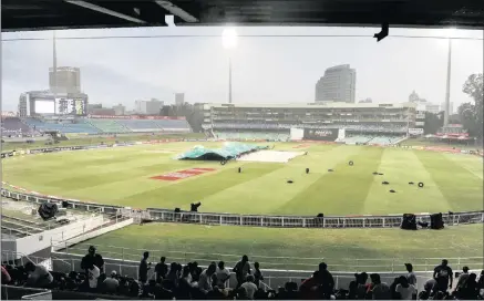  ??  ?? LOVELY WEATHER FOR DUCKS: Heavy rain and wind forced the covers to be brought on in the One-Day Cup final between the Dolphins and Warriors at Kingsmead yesterday. The match was finally called off with the Dolphins struggling on 154-6 and is...