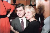  ?? Ray Stubblebin­e / Associated Press file photo ?? In this Feb. 23, 1988 photo, Massachuse­tts Gov. and evenual Democratic presidenti­al nominee Michael Dukakis with his cousin Olympia Dukakis during fundraiser in New York.