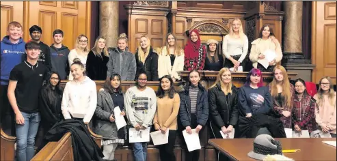  ??  ?? ■
Pictured: Loughborou­gh College law students bring a murder trial to life at the National Justice Museum.