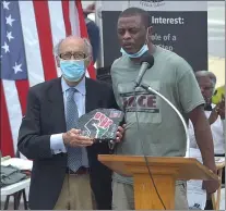  ?? PETE BANNAN - MEDIANEWS GROUP ?? Delaware County Veterans Memorial Founding member Claude de Botton was presented with a designed artwork for placement at the memorial by JACE organizer Richard Blye.