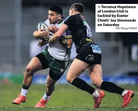  ?? Phil Mingo/PPAUK ?? > Terrence Hepetema of London Irish is tackled by Exeter Chiefs’ Joe Simmonds on Saturday