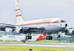  ??  ?? File photo shows a Qantas Boeing 707 landing at Sydney Internatio­nal Airport. — AFP photo