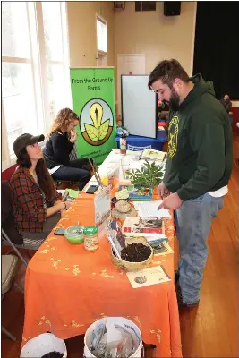  ?? PHOTOS BY ED BOOTH — ENTERPRISE-RECORD ?? Janel Luke, left of the Camp Fire Restoratio­n Project chats with Edward Fortenberr­y, owner of Paradise Permacultu­re, at the Seed and Scion Swap at Trinity United Methodist Church in Chico, California, Saturday, Feb. 4, 2023.