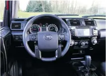  ??  ?? The 4Runner’s dash layout is somewhat busy, but I found all controls and switches easy to navigate.