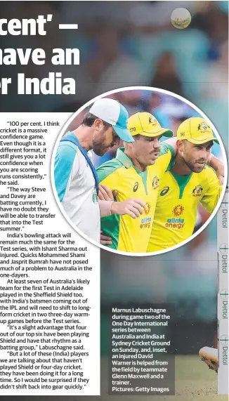  ??  ?? Marnus Labuschagn­e during game two of the One Day Internatio­nal series between Australia and India at Sydney Cricket Ground on Sunday, and, inset, an injured David Warner is helped from the field by teammate Glenn Maxwell and a trainer. Pictures: Getty Images