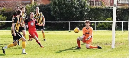  ?? ?? The Gala Wilton goalkeeper waits to gather the ball during the Gloucester­shire County League game against Shirehampt­on