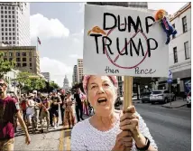  ?? JAY JANNER / AMERICAN-STATESMAN ?? Sheila Kuschke participat­es in the Impeachmen­t March Austin on Congress Avenue on Sunday.