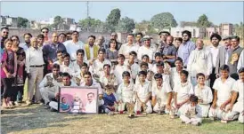  ??  ?? Young kids and others posing at the opening of National Cricket Club’s new centre in Lucknow on Sunday.