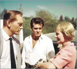 ?? Associated Press ?? PROLIFIC ACTOR Whitman, center, had more than 180 film and TV credits from 1951 to 2000, including “The Sound and the Fury” with Yul Brynner and Joanne Woodward.