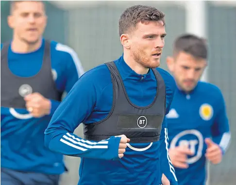  ??  ?? CAPTAIN’S CALL: Andy Robertson hopes the remaining players can do their colleagues justice tonight at Hampden.