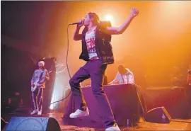 ?? SCOTT DUDELSON GETTY IMAGES ?? 24KGOLDN performs at the Fonda Theatre on Jan. 13. The rapper’s song “Mood” has become a streaming hit, landing atop Spotify’s coveted Global Top 50 chart.