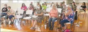  ?? Westside Eagle Observer/SUSAN HOLLAND ?? Ladies interested in forming a new Extension Homemakers Club in the area visit with one another as they wait for their meeting to begin Tuesday evening, Sept. 7. Women from Sulphur Springs, Gravette, Decatur, Gentry and Highfill met, organized a new club, voted on new officers and named the club the Jolly Good Times Extension Homemakers Club.