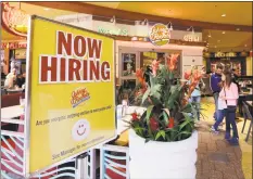  ?? Associated Press file ?? The National Retail Federation expects retailers will hire between 585,000 and 650,000 workers nationwide in November and December, up from 582,500 a year ago.
