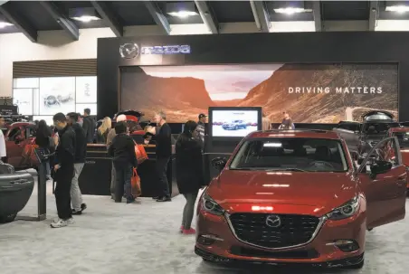  ?? PHOTOS BY THE INTERNATIO­NAL AUTO SHOW ?? Above: The San Francisco Chronicle 61st annual Internatio­nal Auto Show features more than 600 vehicles from major manufactur­ers. Below left: The 2019 Genesis G70 will be on display. Below right: The Auto Salon showcases modified cars and industry trendsette­rs.