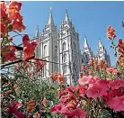  ?? AP ?? Flowers bloom in front of the Salt Lake Temple, at Temple Square, in Salt Lake City. The Church of Jesus Christ of Latter-day Saints yesterday came out in support of The Respect for Marriage Act under considerat­ion in Congress after years of opposing recognitio­n of same-sex marriage.