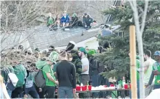  ?? BOB TYMCZYSZYN/STANDARD FILE PHOTO ?? Several hundred people take over parts of Jacobson Avenue as they celebrate St. Patrick's Day in St. Catharines last March.