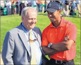  ?? AP FILE ?? Jack Nicklaus, left, and Tigers Woods, are shown chatting in this 2012 file photo after Woods won the Muirfield Vollage tourney in Dublin, Ohio. For the second time in three years, though, Woods will not play in the Masters, which begins Thursday.