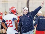  ?? PHOTO] [AP ?? Youngstown State coach Bo Pelini, seen here during a 2015 practice, sought out and convinced Ma’lik Richmond to join the team earlier this year. The convicted rapist arrived on campus with no known intentions to play football.