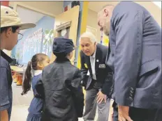  ?? ?? YUMA CITY COUNCIL MEMBERS Gary Knight and Chris Morris greeted and shook hands with the VIP students as they entered the classroom.