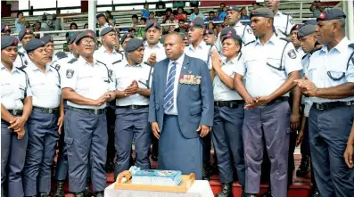  ?? Photo: Ronald Kumar ?? Minister for Defence, National Security and Policing Inia Seruiratu with members of Fiji Police Force following the passing-out parade 2020 at Ratu Cakobau Park in Nausori on July 16, 2020.