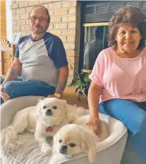  ?? COURTESY PHOTO ?? Johnny and Dorothy Martinez decided they wanted a dog again after a few years without one. They found someone who had to give up their two dogs, and not wanting to separate them, adopted Thomas and Tabitha.