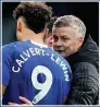  ??  ?? WELL DONE: Ole with Dominic Calvert-Lewin