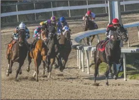  ?? The Associated Press ?? CRACKING DOWN ON DOPING: In this image provided by Hodges Photograph­y, Quick Tempo with Adam Beschizza aboard led gate to wire to win the 71st running of the Sugar Bowl Stakes at Fair Grounds race course on Nov. 19 in New Orleans.