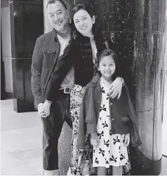  ?? ?? Beauty Gonzalez (center) with husband Norman Crisologo and daughter Olivia