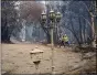  ?? MARCIO JOSE SANCHEZ — THE ASSOCIATED PRESS ?? A fire-ravaged neighborho­od is seen Aug. 25 in Boulder Creek after the CZU August Lightning Complex Fire passed by.