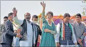  ??  ?? Congress general secretary Priyanka Gandhi Vadra with party workers during Kisan Mahasabha, in Bijnor on Monday.