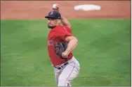  ?? Brynn Anderson / Associated Press ?? Red Sox starting pitcher Nathan Eovaldi delivers a pitch during on Sunday against the Twins in Fort Myers, Fla.