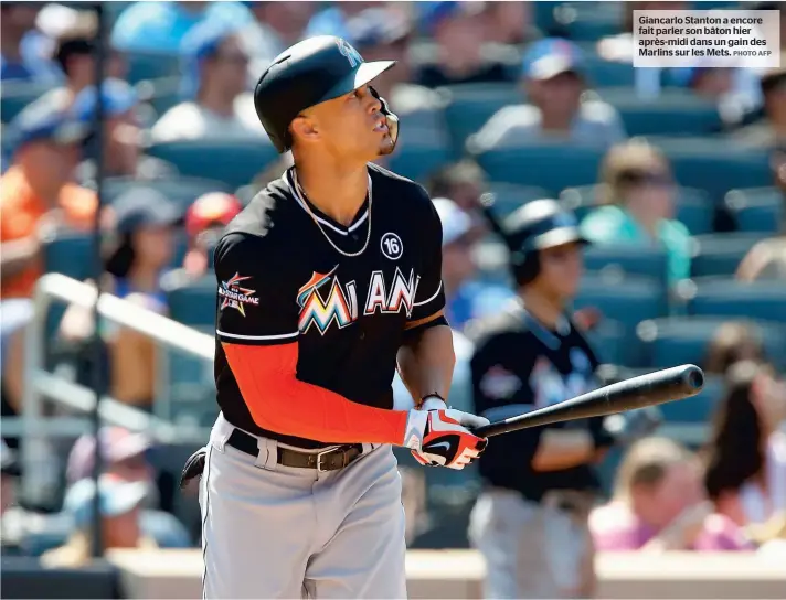  ?? PHOTO AFP ?? Giancarlo Stanton a encore fait parler son bâton hier après-midi dans un gain des Marlins sur les Mets.