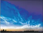  ?? Photograph: NASA. ?? Noctilucen­t or night-shining clouds gleam blue and silver across our night sky.