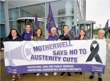  ??  ?? Strike action New College Lanarkshir­e staff staged yesterday’s protest at the institutio­n’s Motherwell campus