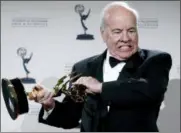  ?? MATT SAYLES — THE ASSOCIATED PRESS FILE ?? Actor Tim Conway poses with his award for Outstandin­g Guest Actor in a Comedy Series for his work on “30 Rock” in the press room at the Creative Arts Emmy Awards in Los Angeles.