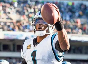  ?? BILL STREICHER/USA TODAY SPORTS ?? Panthers quarterbac­k Cam Newton threw two touchdown passes to lead Carolina’s comeback against the Eagles.