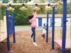  ?? Tyler Sizemore / Hearst Connecticu­t Media ?? Children play on the playground during recess at Springdale Elementary School in Stamford on Thursday. Stamford schools reopened playground­s this week for the first time since the beginning of the pandemic.