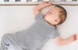  ?? Picture: istock ?? SAFE PRACTICE: Babies should sleep on their backs on a firm mattress with a tightly fitting sheet and no other bedding or toys around them.