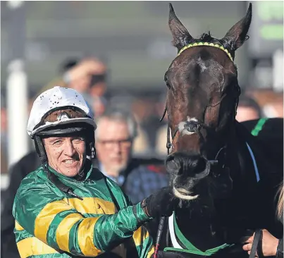  ?? Picture: PA. ?? Winning combinatio­n: Buveur D’air and Barry Geraghty celebrate victory in the Unibet Champion Hurdle.