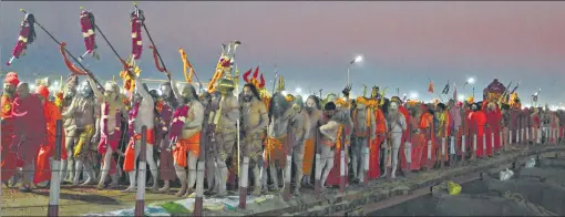  ?? HT PHOTO ?? ▪ Naga sadhus proceeding for the last ‘shahi snan’ in Sangam at Prayagraj on Sunday.