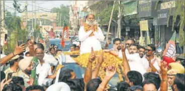  ?? SANJEEV SHARMA/ HT PHOTO ?? BJP candidate Anil Vij during his victory procession in Ambala, Haryana, on Thursday.