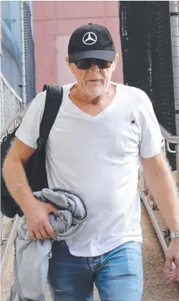  ?? Picture: ANNIE PERETS ?? Wayne Thomas Holland leaves Southport Magistrate­s Court after appearing accused of being found with 12kg of ice in his car.